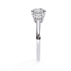White Gold engagement ring featuring three cushion cut diamonds