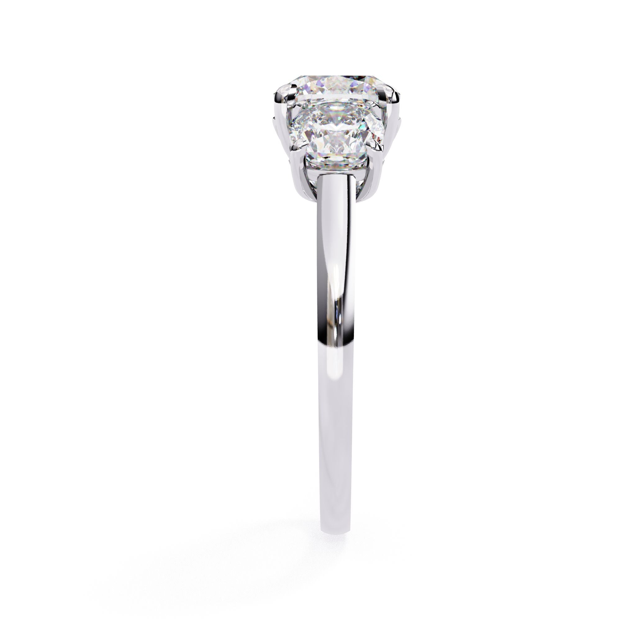 White Gold engagement ring featuring three cushion cut diamonds