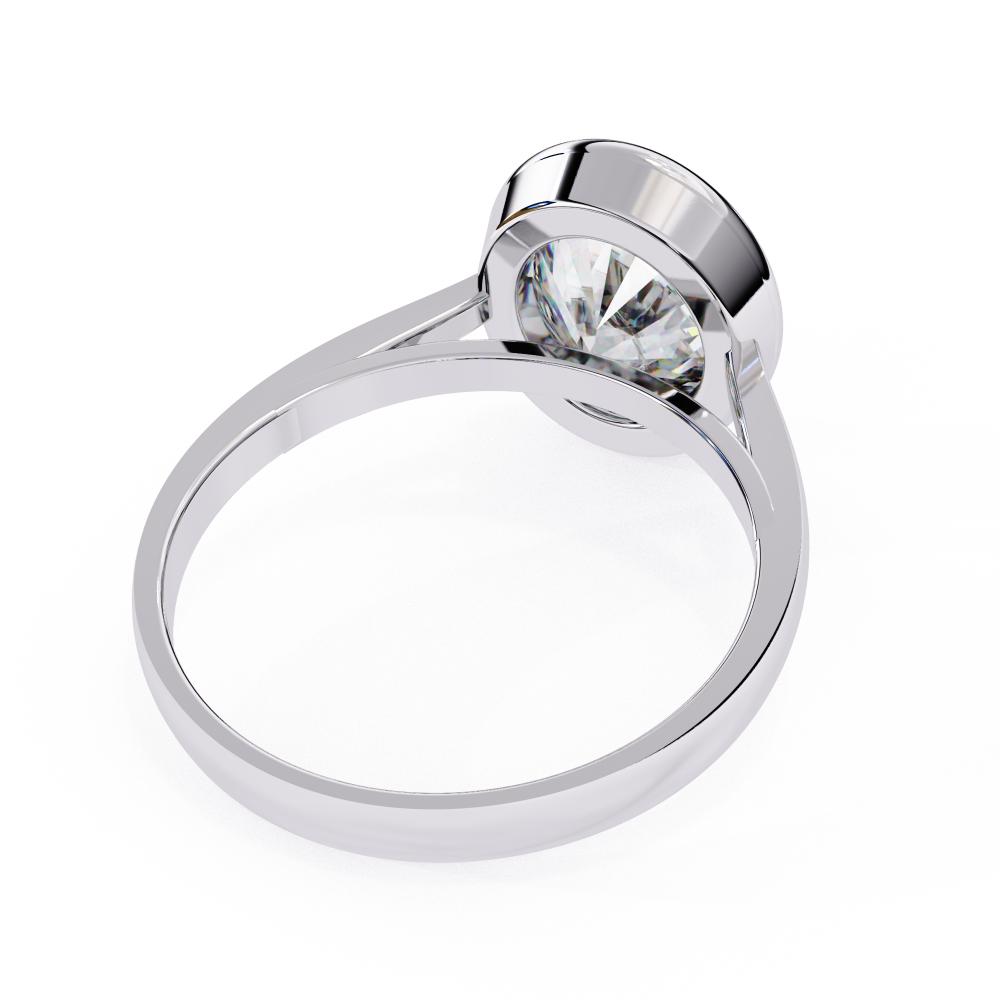 White gold ring with a clear gemstone on a white background