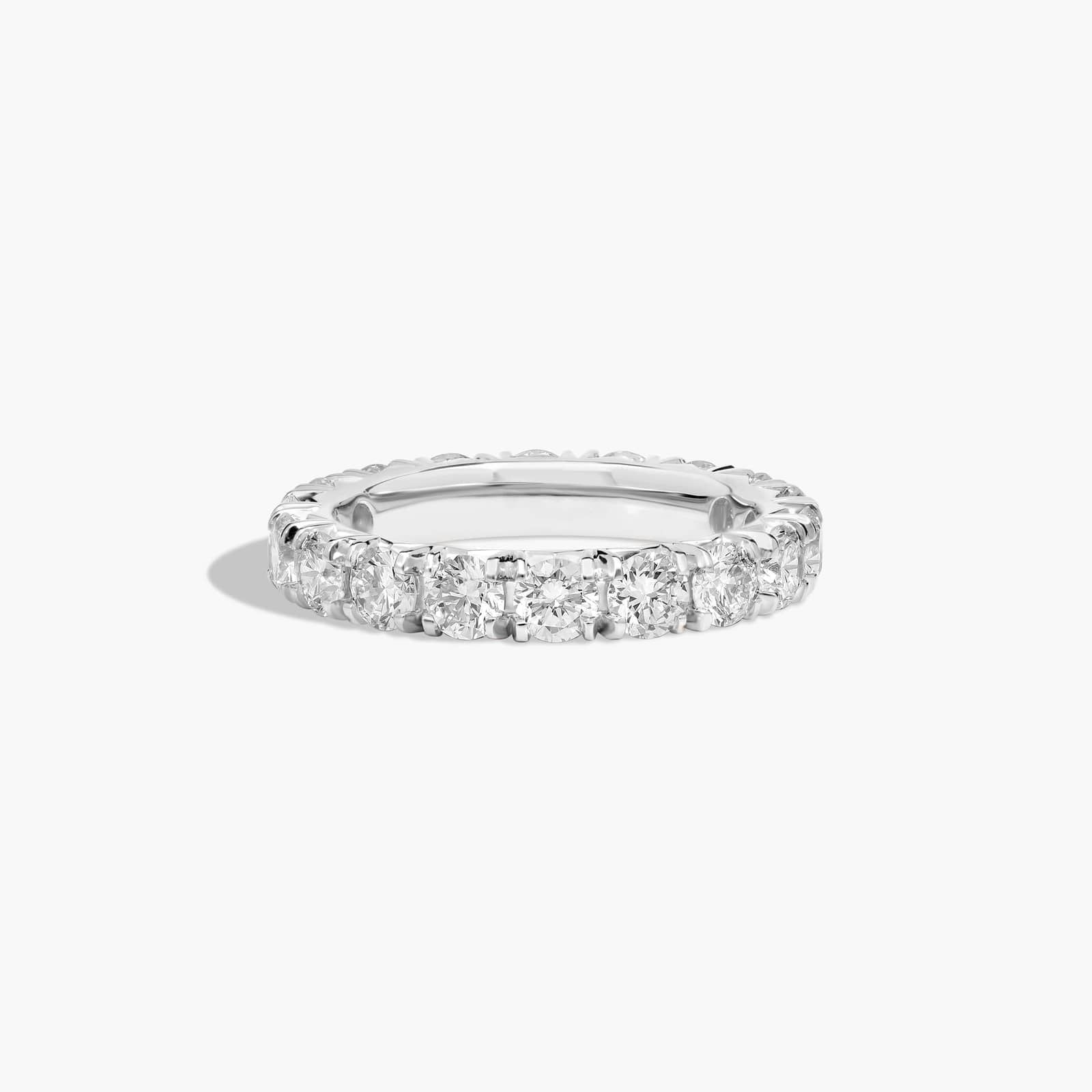 French pavé diamond wedding band in white gold eternity style