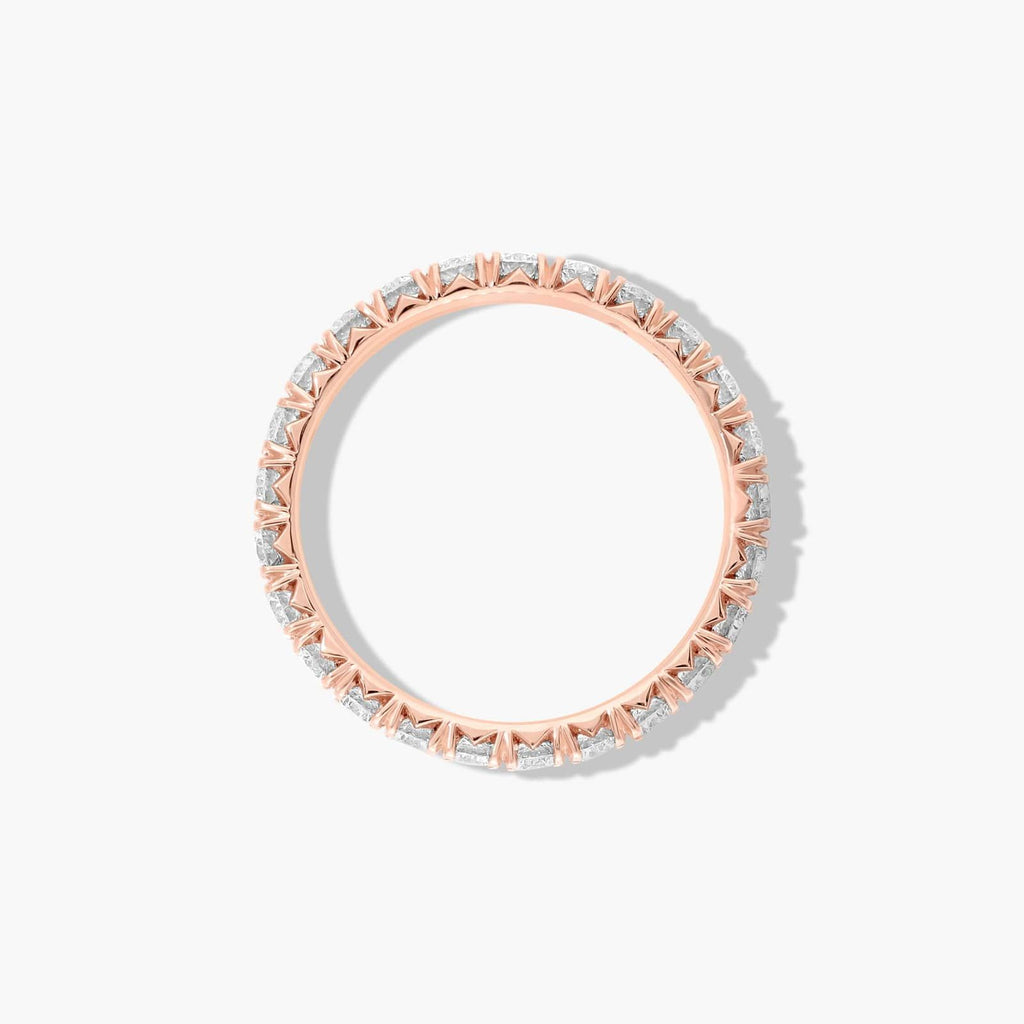 Classic yet modern diamond wedding band with refined pavé setting