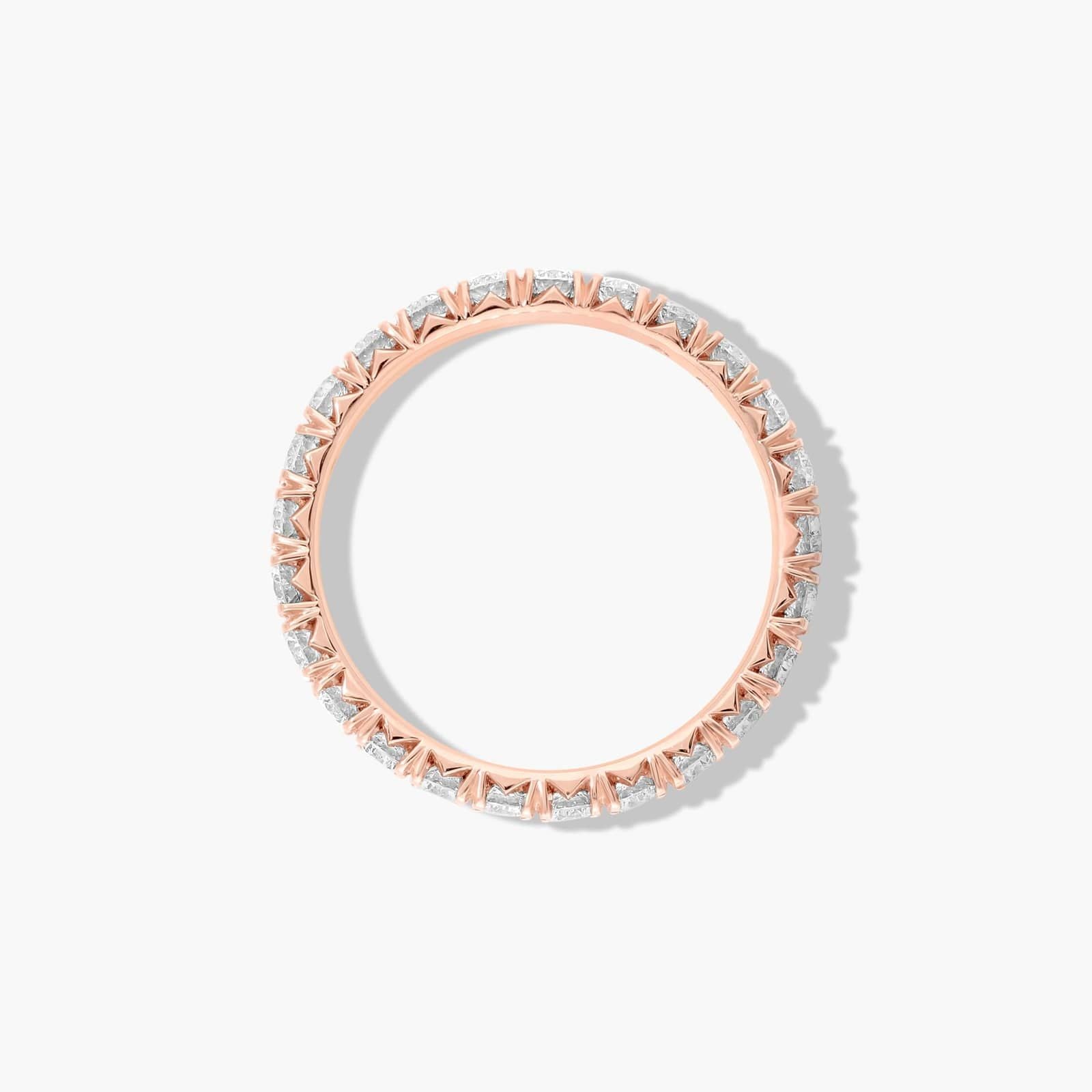 Classic yet modern diamond wedding band with refined pavé setting
