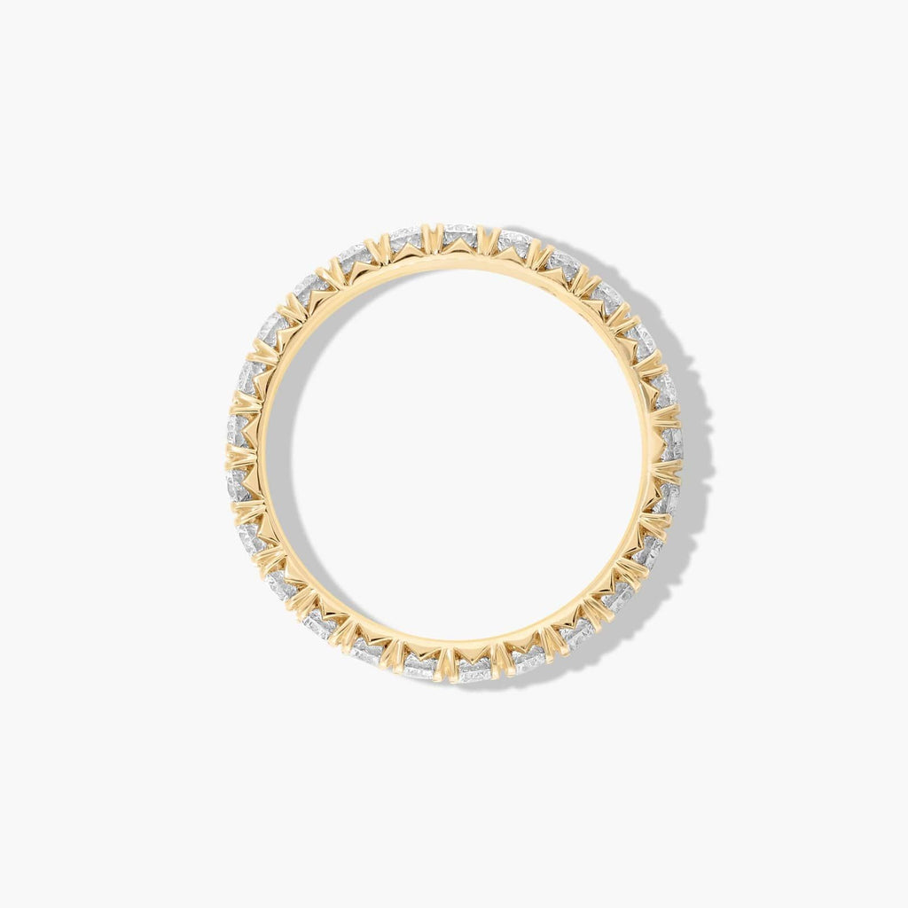 Classic yet modern diamond wedding band with refined pavé setting