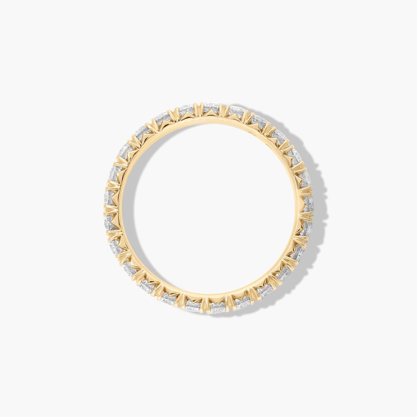 Classic yet modern diamond wedding band with refined pavé setting