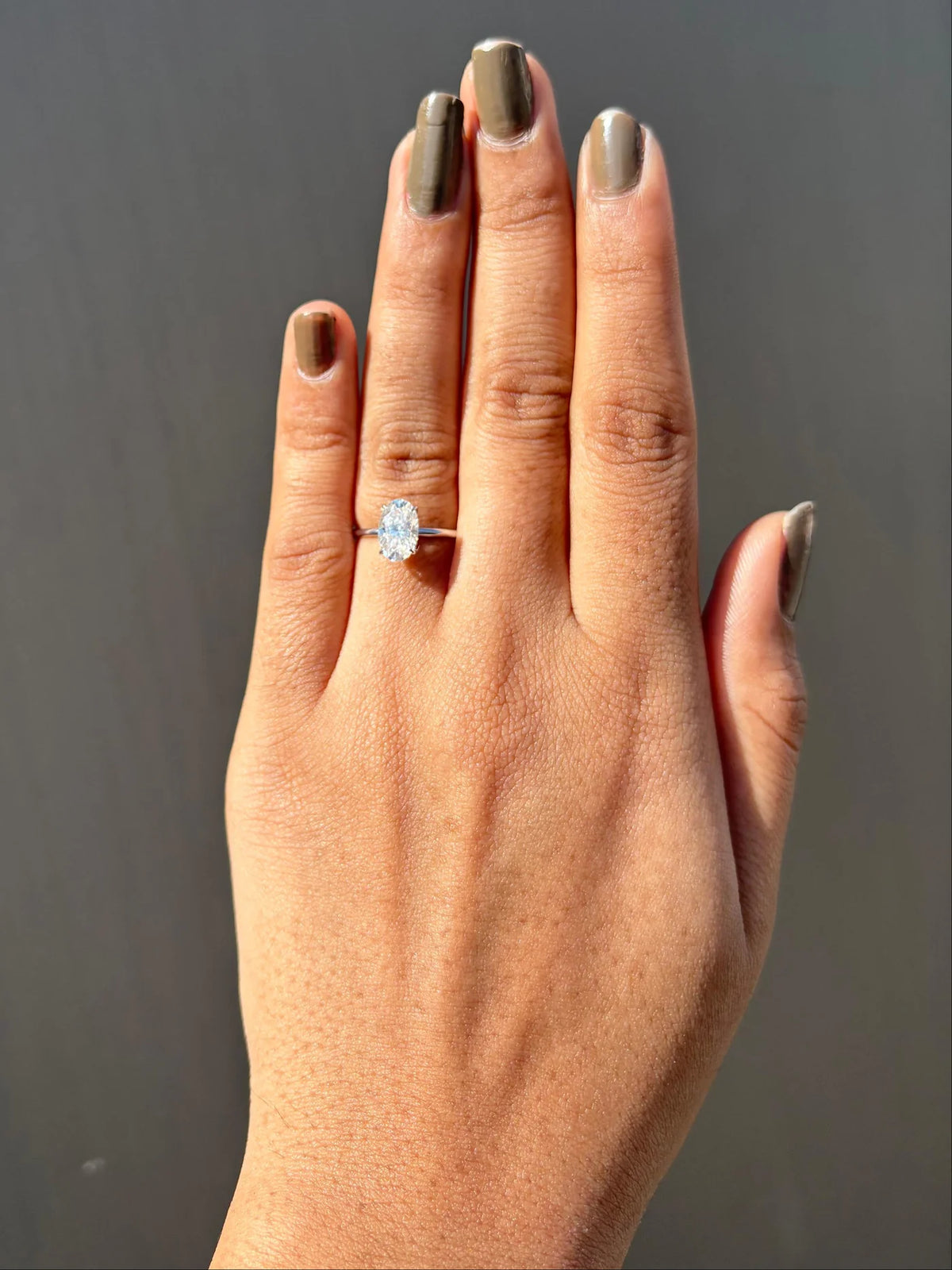 Oval Cut Diamond with Hidden Halo Solitaire Ring in Gold