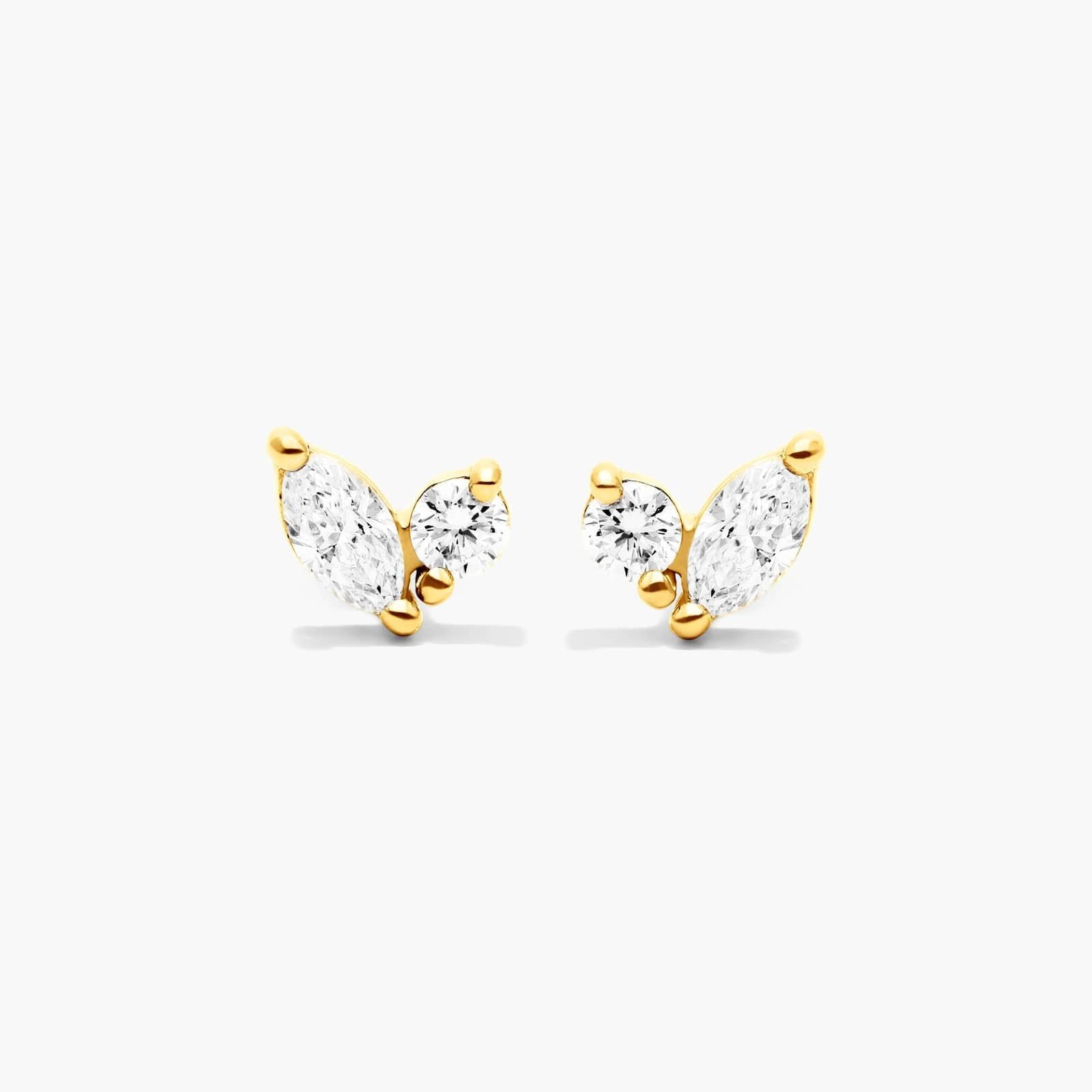 Marquise and round diamond stud earrings in gold