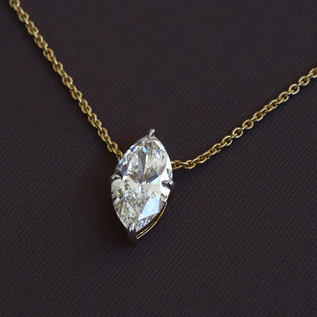 Luxurious Gold Marquise-Cut Diamond Solitaire Pendant Necklace