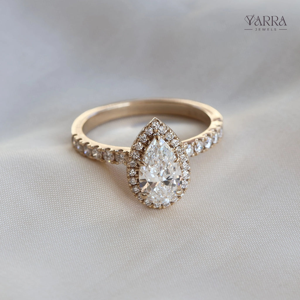 Exquisite Pear-Cut Diamond Engagement Ring with Pave Ring in Gold