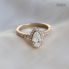 Exquisite Pear-Cut Diamond Engagement Ring with Pave Ring in Gold