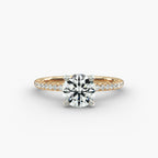 Petite pavé diamond engagement ring in gold with round diamond