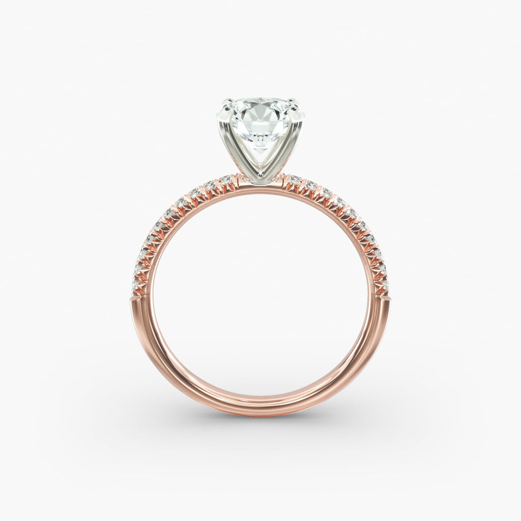 Petite pavé diamond engagement ring in rose gold with round diamond