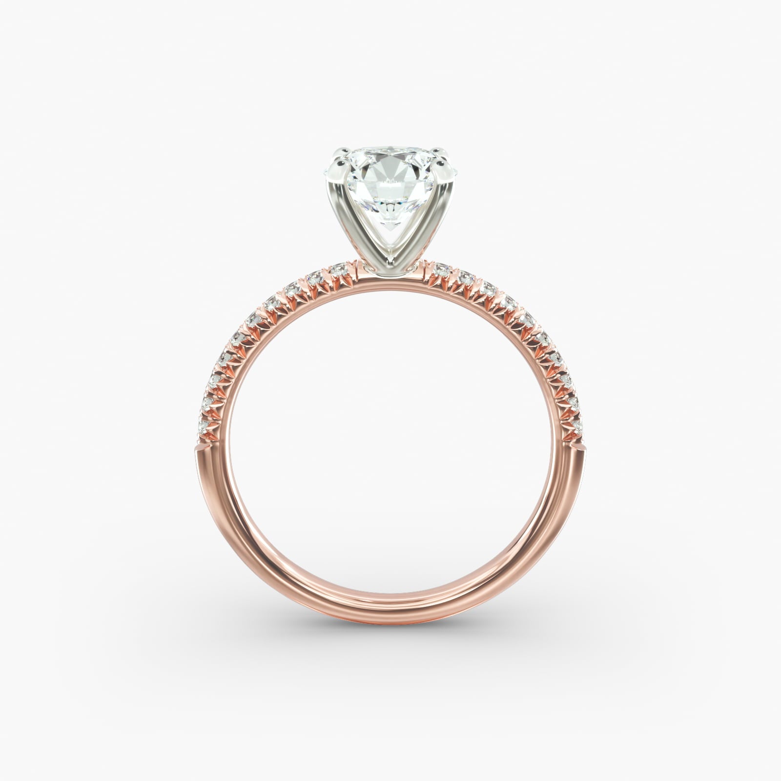 Petite pavé diamond engagement ring in rose gold with round diamond