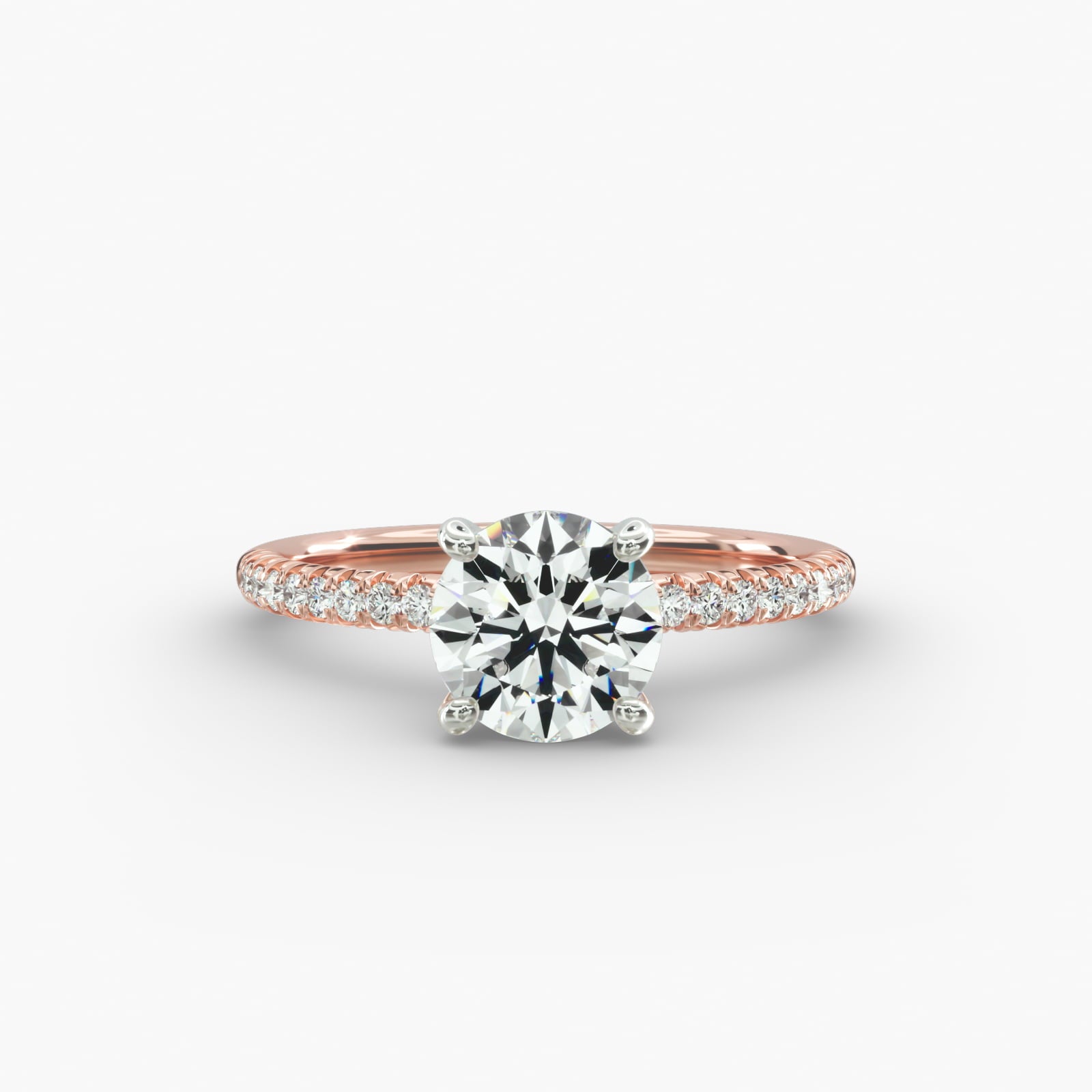 Bridal diamond ring with round solitaire and pavé shoulders