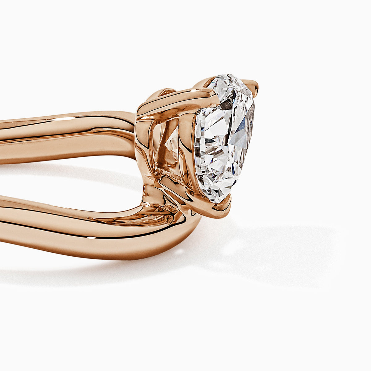 Pear Solitaire Bypass Engagement Ring in Gold