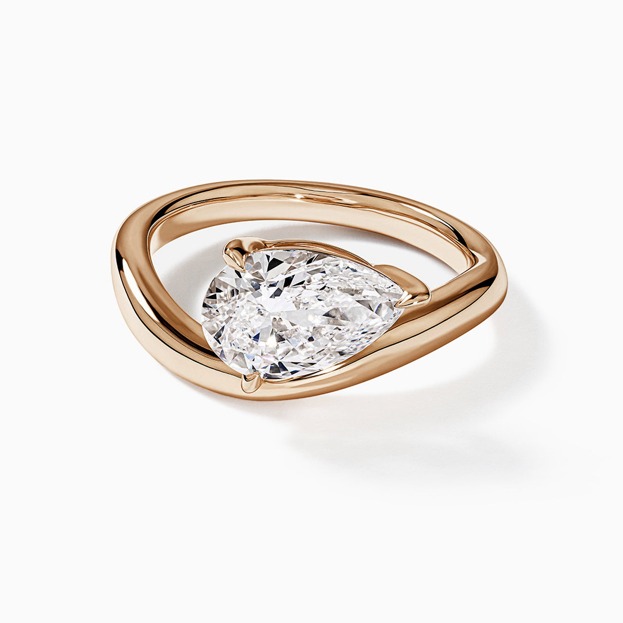 Pear Solitaire Bypass Engagement Ring in Gold