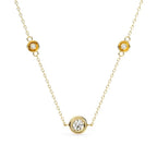 Round bezel-set diamond pendant in gold