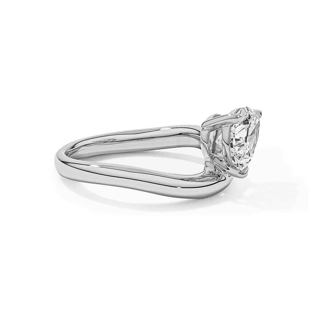 Pear Solitaire Bypass Engagement Ring in Gold
