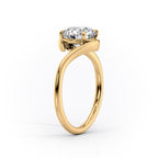 Oval Solitaire Bypass Engagement Ring in Gold