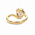 Oval Solitaire Bypass Engagement Ring in Gold
