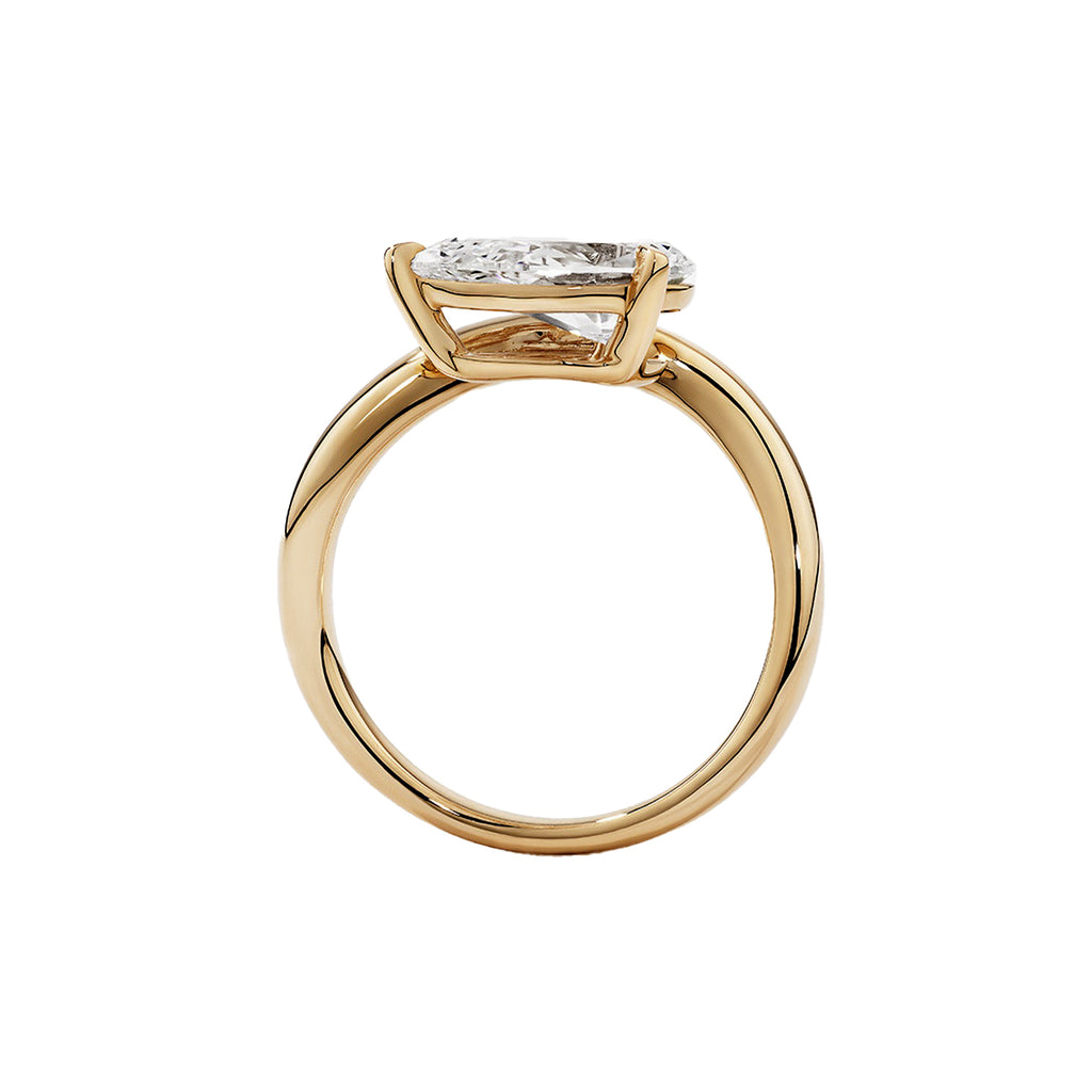 Pear Solitaire Bypass Engagement Ring in Gold