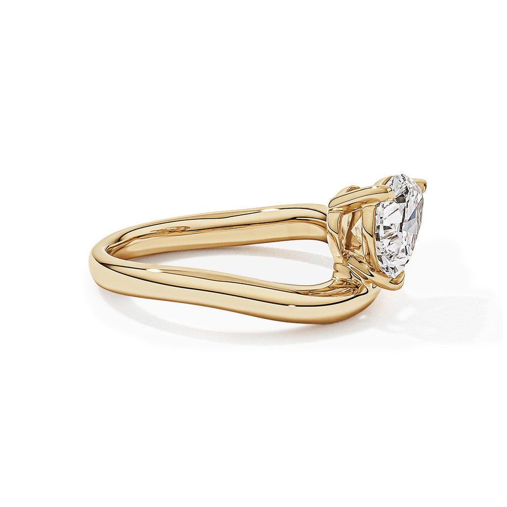 Pear Solitaire Bypass Engagement Ring in Gold