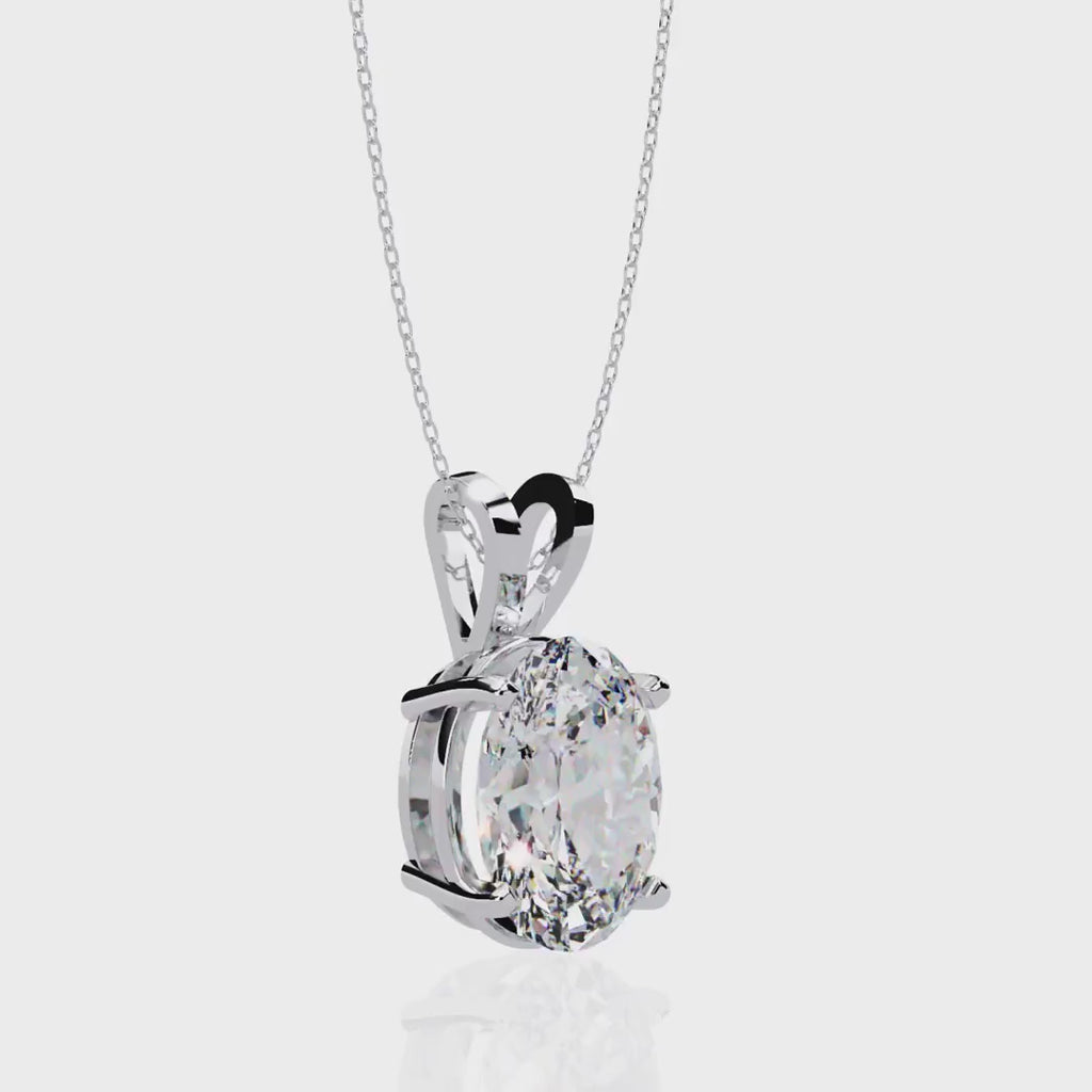 Oval Cut Diamond Solitaire Pendant in Gold
