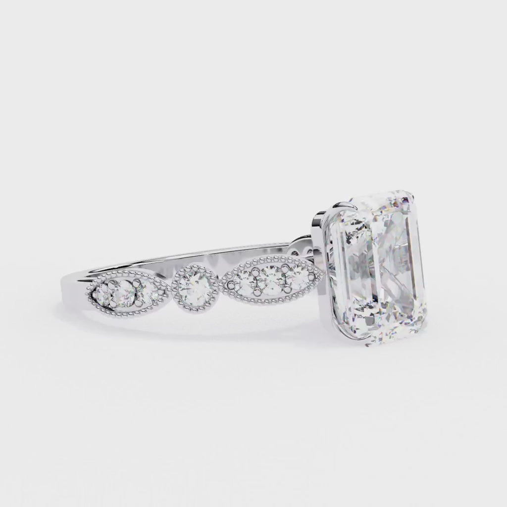 Emerald diamond ring in Milgrain Cathedral setting