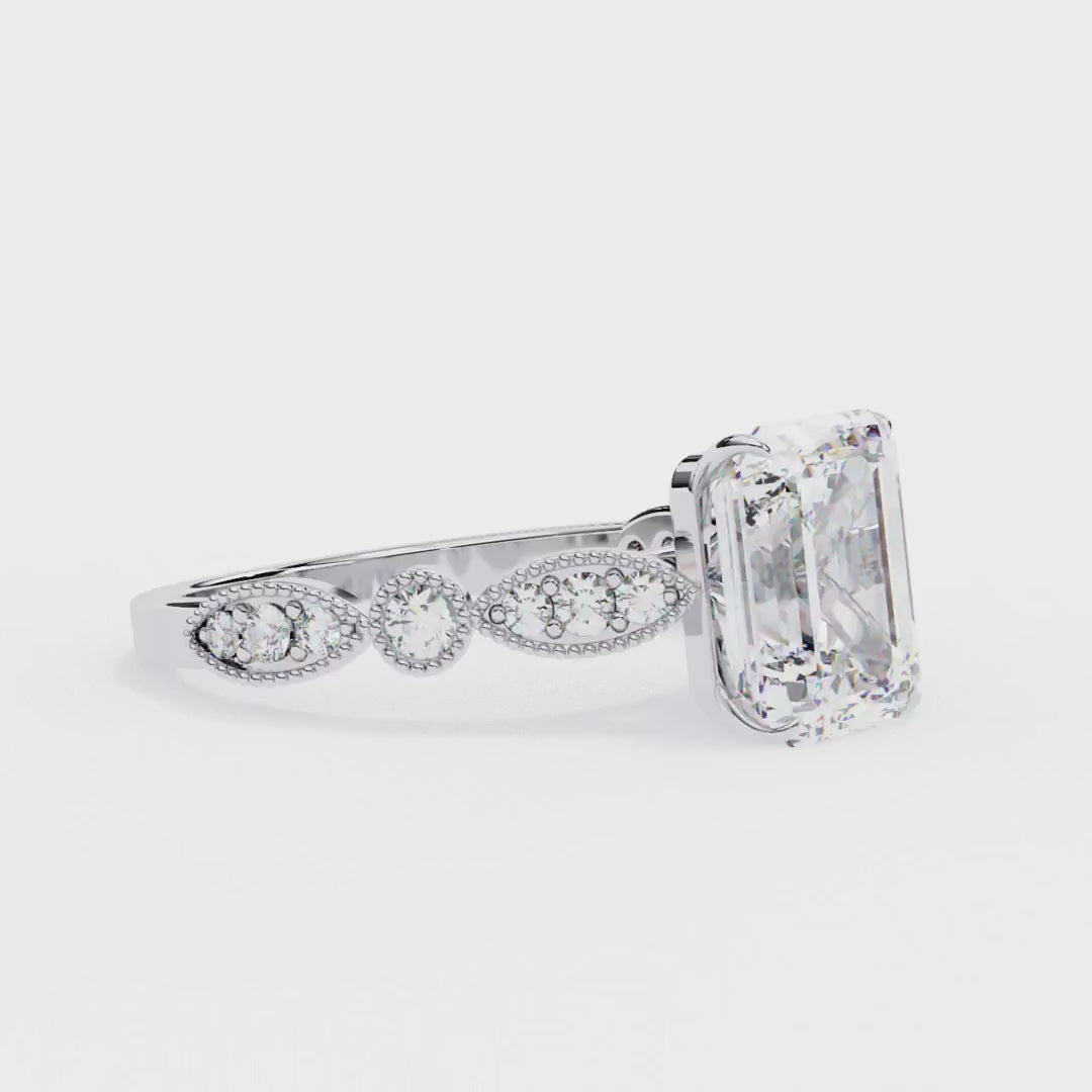 Emerald diamond ring in Milgrain Cathedral setting