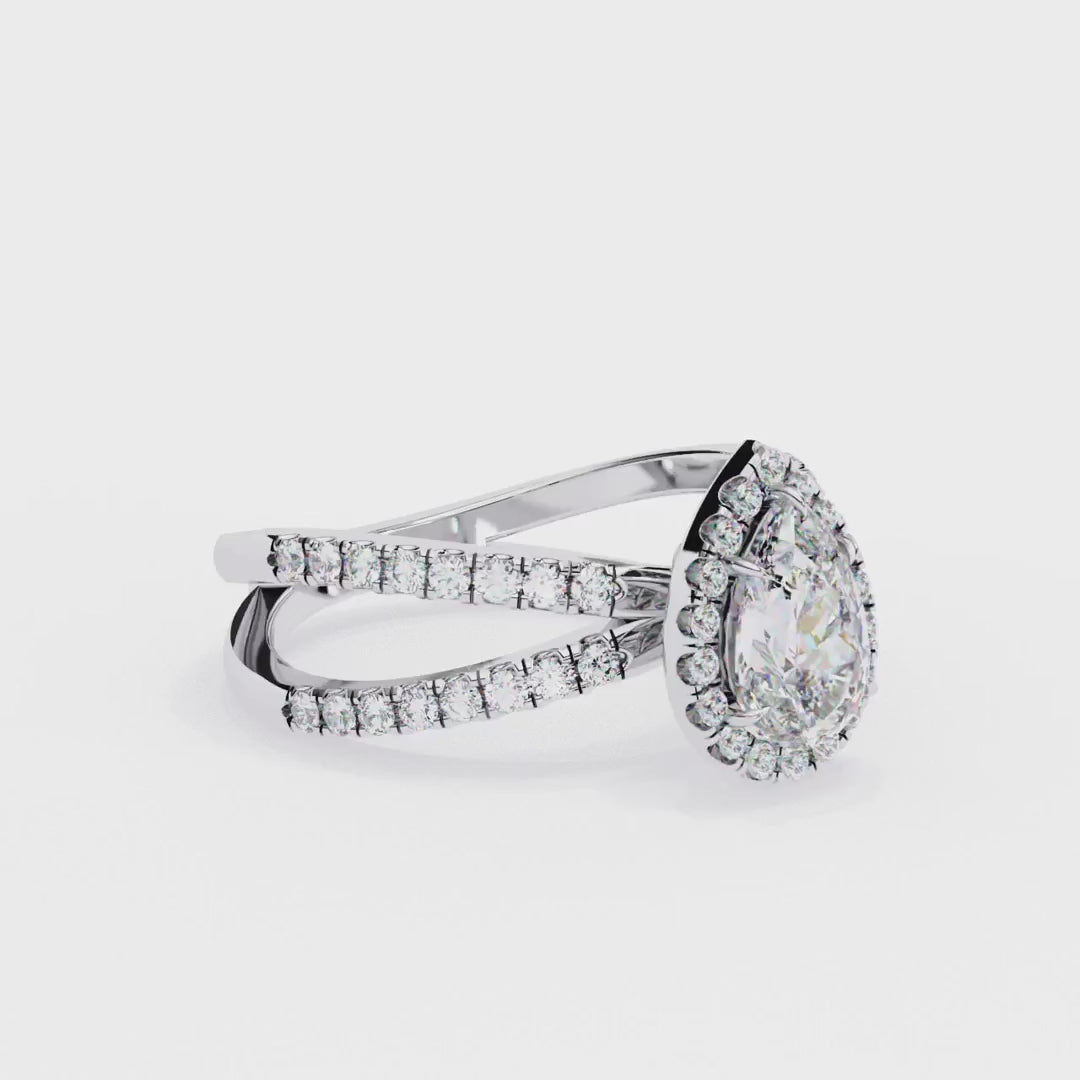 Pear halo diamond engagment ring with crossover design