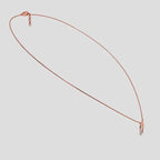 Rose Gold necklace with a unique diamond pendant on a white background