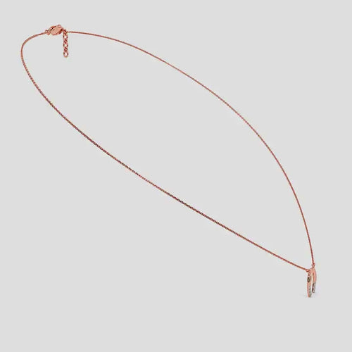 Rose Gold necklace with a unique diamond pendant on a white background