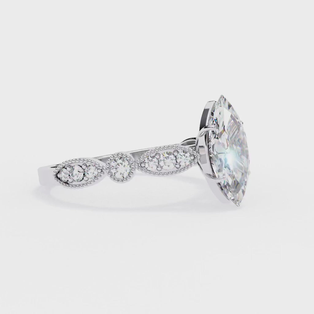Marquise diamond ring in Milgrain Cathedral setting