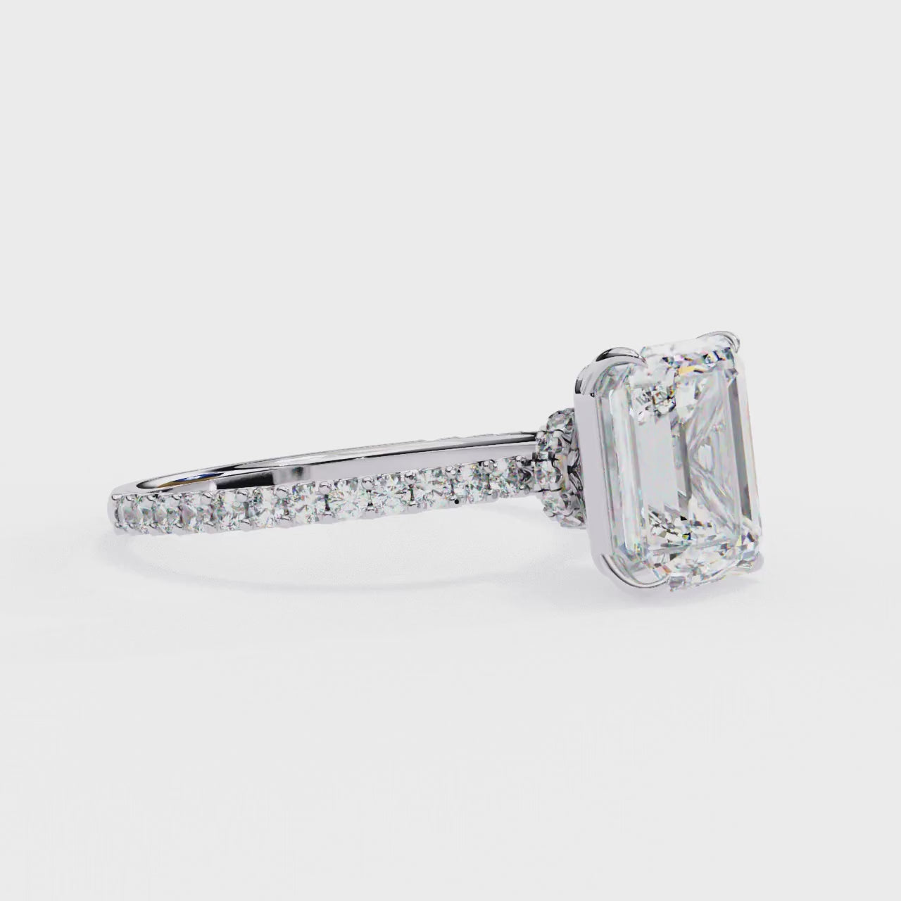 Lab grown diamond engagement ring with Emerald center