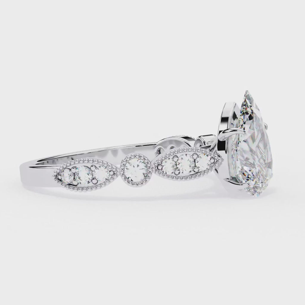 Pear shape diamond ring in Milgrain Cathedral setting