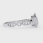Pear shape diamond ring in Milgrain Cathedral setting