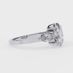 Oval cut three-stone diamond engagement ring