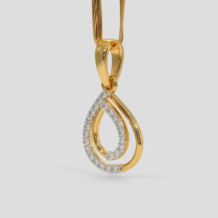 Gold and diamond teardrop pendant on a white background