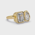 Pear and emerald diamond bezel Toi et Moi engagement ring