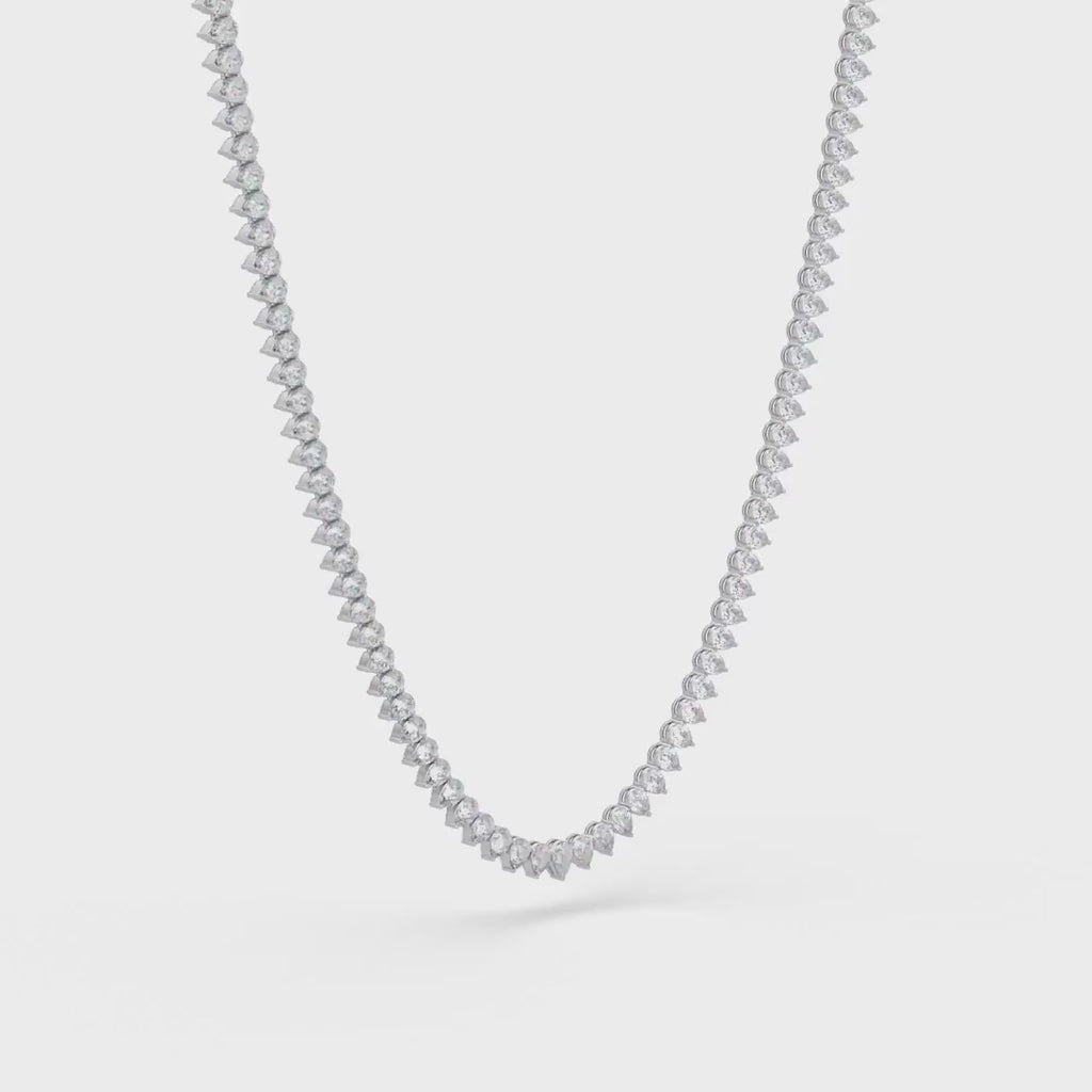Pearl diamond necklace on a white background