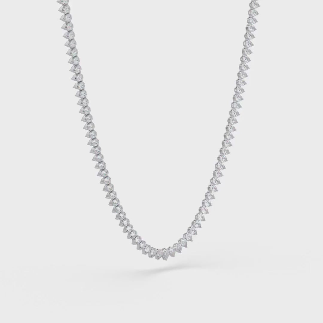 Pearl diamond necklace on a white background