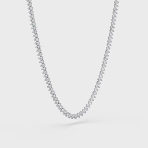 Pearl diamond necklace on a white background