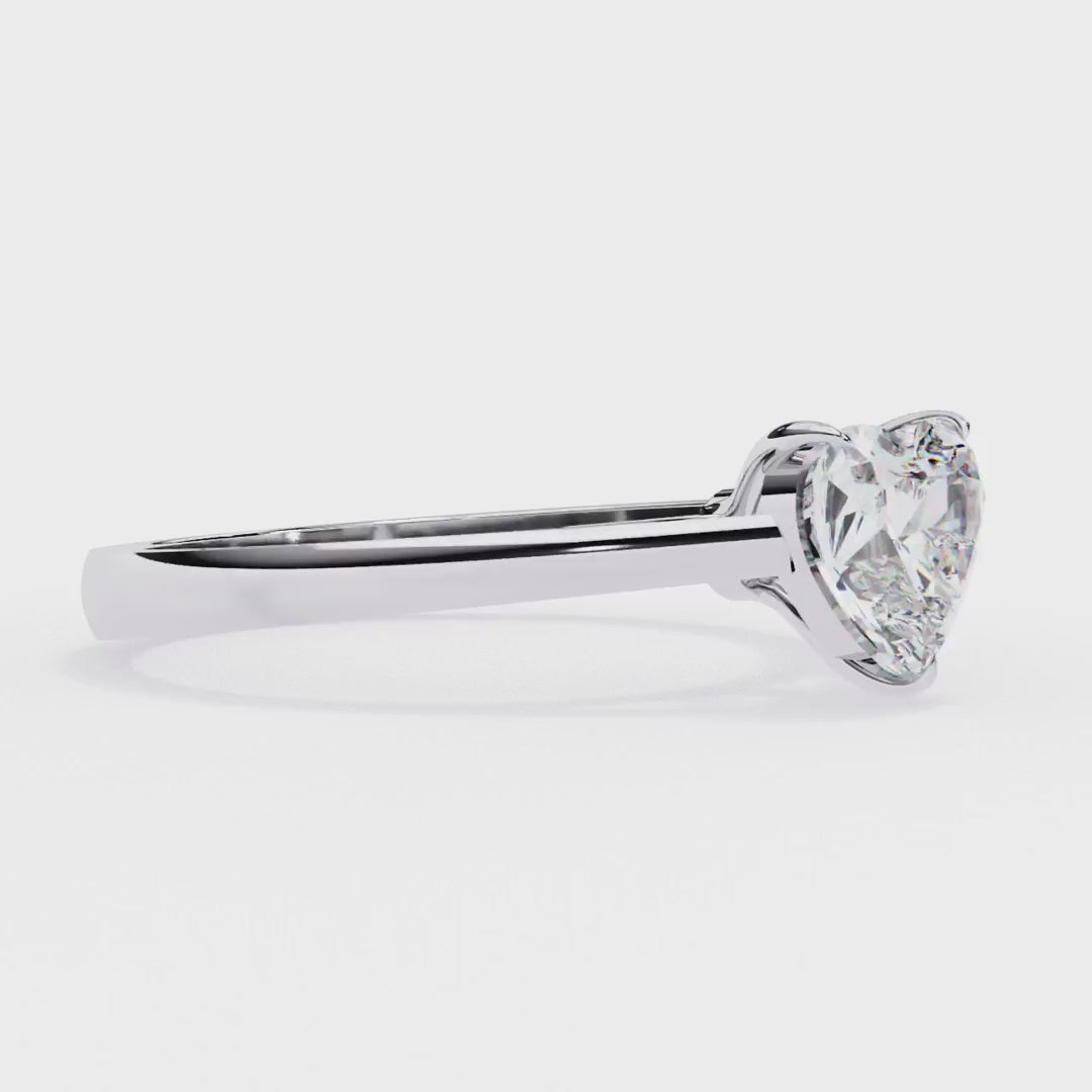 Engagement ring with heart shaped diamond
