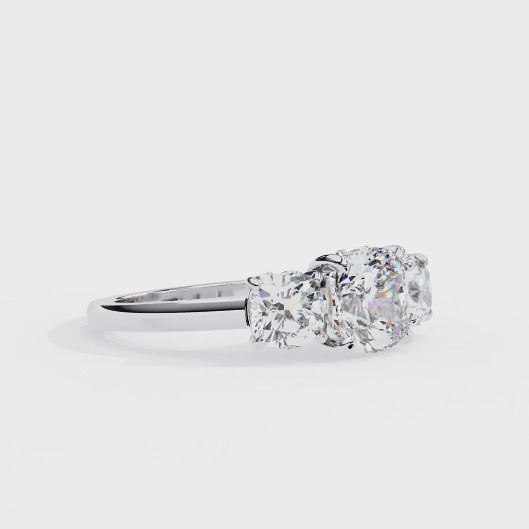 Cushion Cut Three-Stone Diamond Ring in Gold