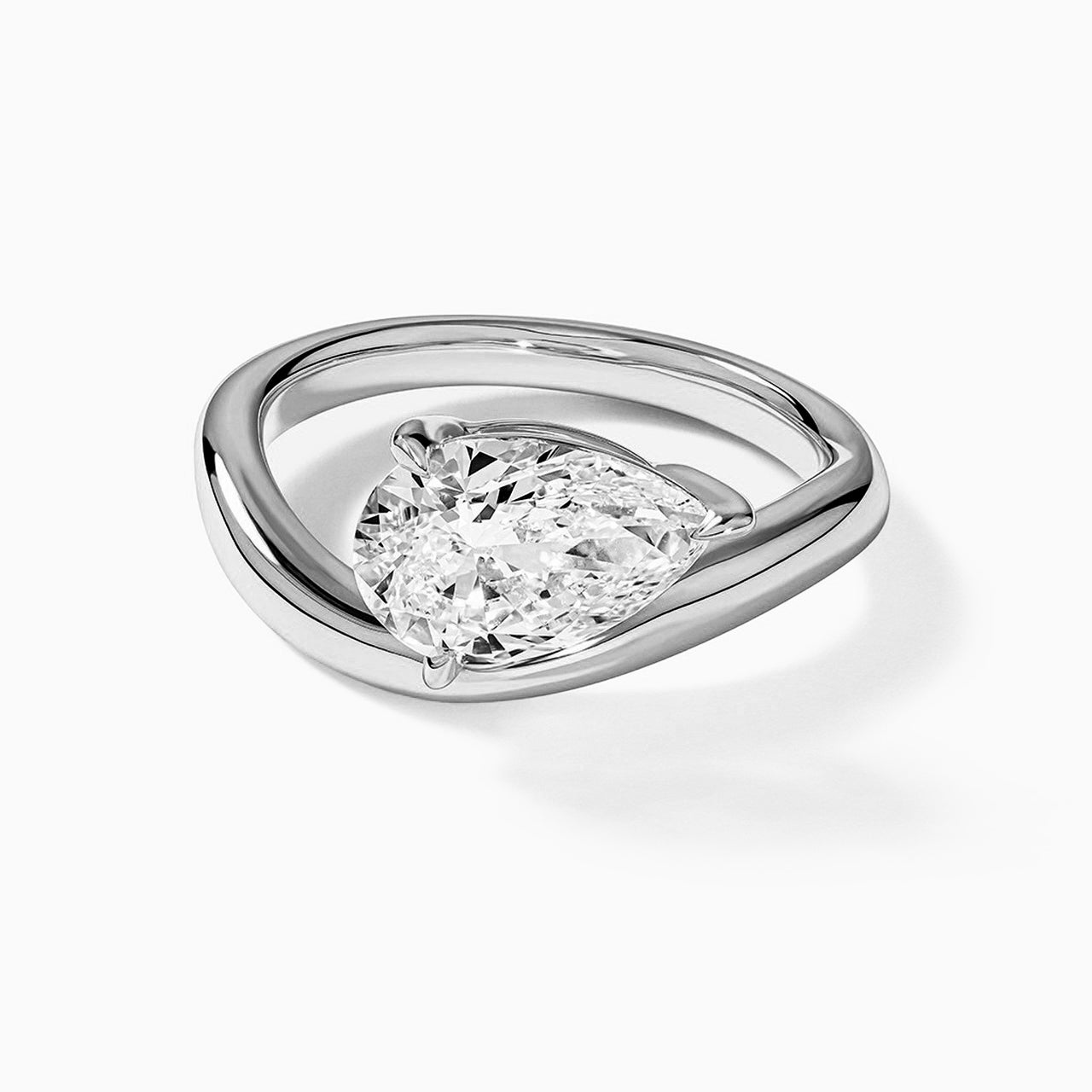 Pear Solitaire Bypass Engagement Ring in Gold